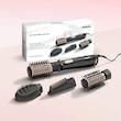 سشوار برس‌دار چرخشی 1000 وات بابیلیس مدل AS964ROE، موتور DC، وزن 1050 گرم، دارای سری برس‌دار گرد باریک، سری برس‌دار تخت، سری چرخشی، سری دندانه‌دار با ویژگی صاف‌کنندگی، با قابلیت فناوری تولید یون