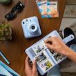 دوربین عکاسی چاپ سریع فوجی فیلم مدل Instax Mini 12 به همراه فیلم