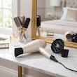 سشوار حرفه‌ای 2400 وات رمینگتون مدل AC9140، موتور AC، وزن 229 گرم، دارای سری متمرکز‌کننده باریک، دیسپانسر با ویژگی صاف‌کنندگی، با قابلیت باد سرد، فناوری تولید یون