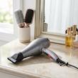 سشوار حرفه‌ای 2200 وات رومئو مدل RM-5858، موتور AC، وزن 450 گرم، المنت فلز، دارای سری متمرکز‌کننده باریک با ویژگی صاف‌کنندگی، حجم‌دهندگی، با قابلیت تنظیم دما، باد سرد
