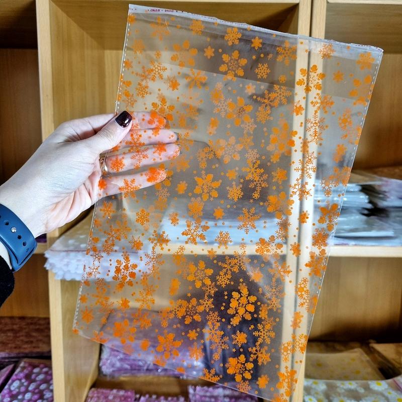 سلفون طرح برف نارنجی ۲۰ در ۲۵ سانت (۱۰ تایی)