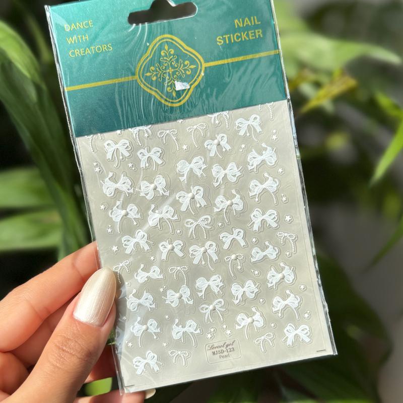 استیکر روسی پاپیون سفید مروارید دار 123