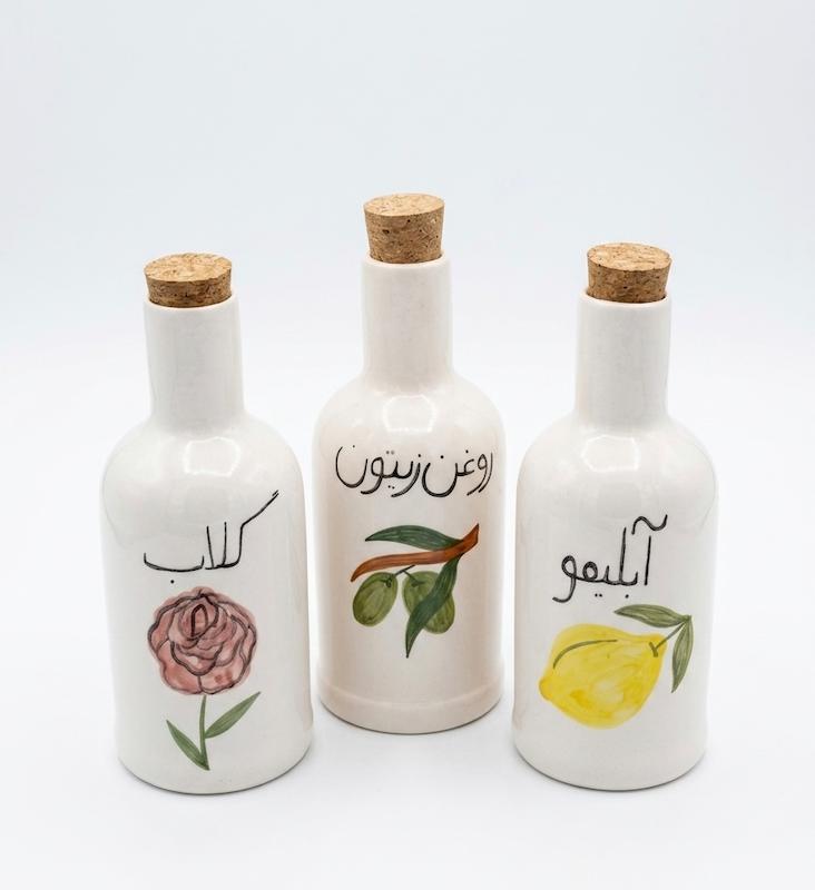 ظرف  آب لیمو، گلاب و روغن زیتون