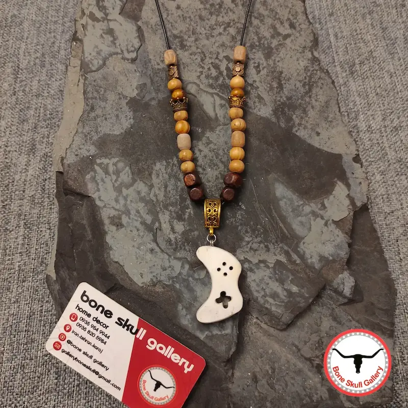 گردنبند استخوان طرح دسته بازی