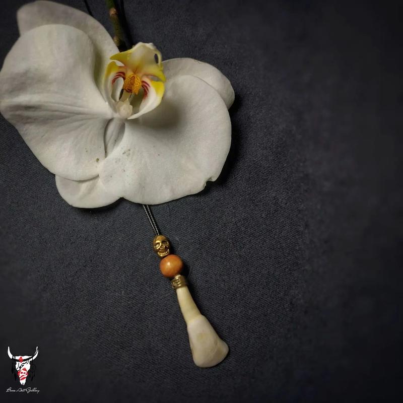 گردنبند دندان گاومیش