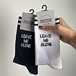 جوراب leave me alone سفيد(سمت راست)