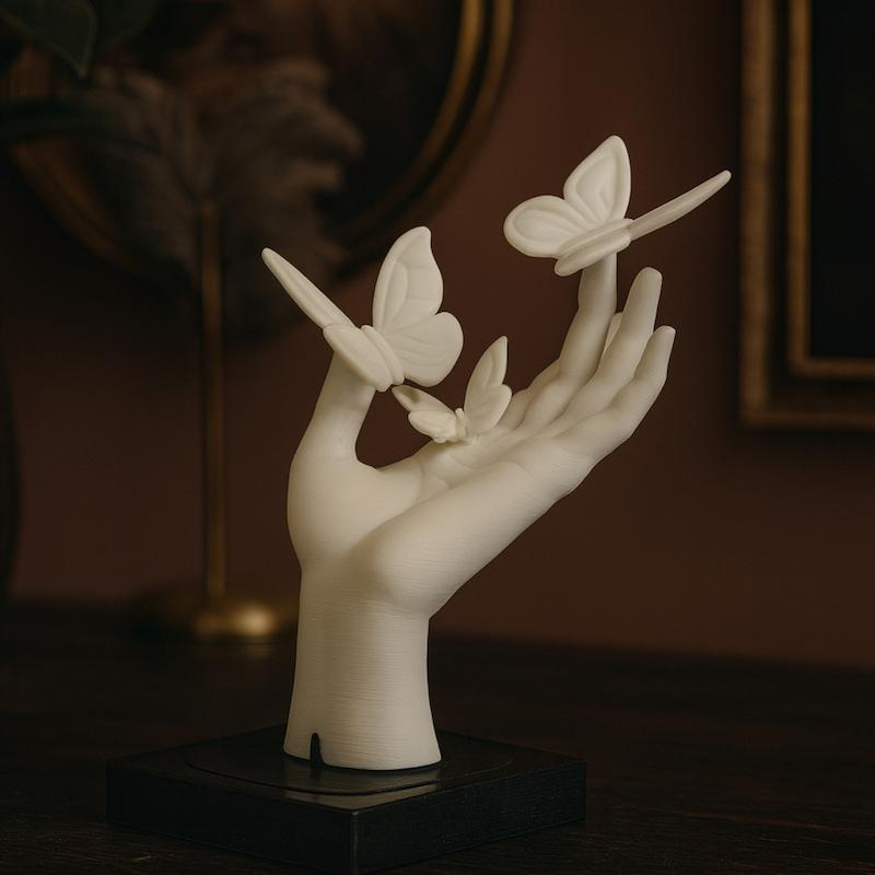 مجسمه دکوری دست پروانه ای