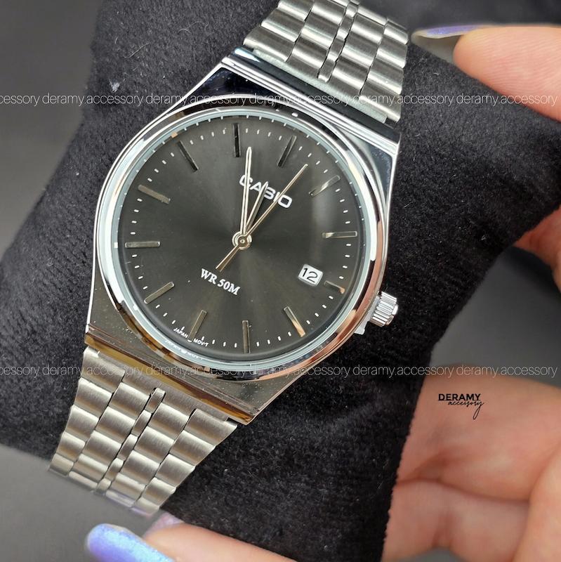 ساعتمچی مردانه کاسیو اولد مانی وینتیج قفل ریلی | ساعت مچی مردانه  کاسیو casio سیلور صفحه مشکی نوک مدادی 50m گادفادر . کد 398-- ژاپن- 