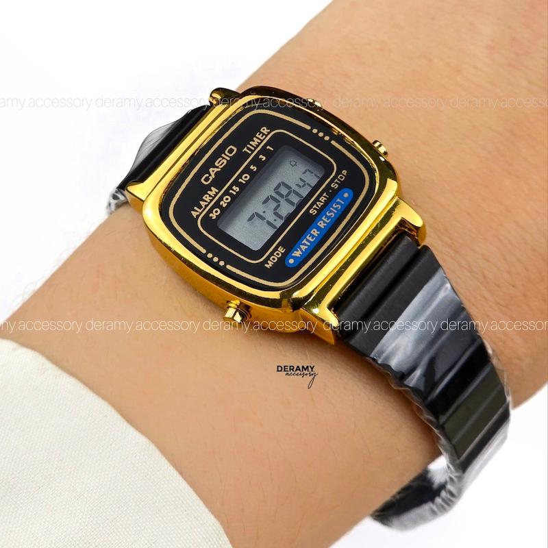 ساعت کاسیو نوستالژی مشکی بند کرکره ای 338 مشکی قاب طلایی | ساعت مچی زنانه casio  292--موتور با کیفیت فول امکانات  [ اف ویژه درامی اکسسوری] --کپی
