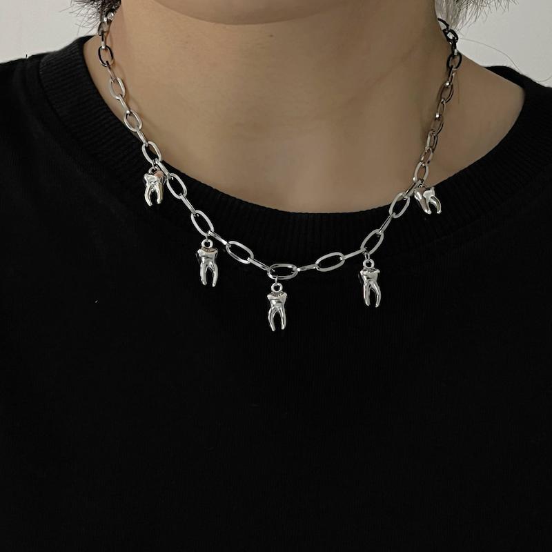 دستبند و گردنبند Teeth 