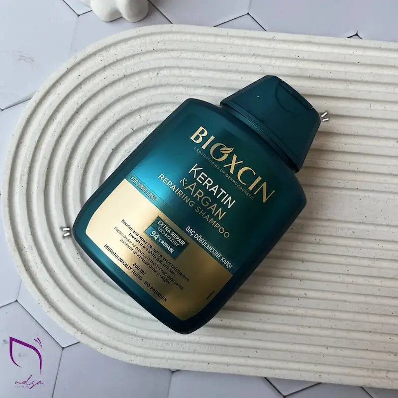 شامپو ضد ریزش ترمیم کننده بیوکسین  اصل 300 میل