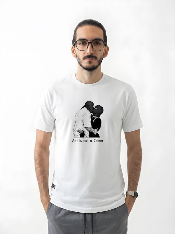 # تیشرت طرح Art Is Not a Crime | هنر جرم نیست  **ART IS NOT A CRIME.**  تیشرت **طرح Art Is Not a Crime** برای کسانی طراحی شده که هنر را فقط یک تصویر روی دیوار یا یک طرح روی لباس نمی‌دانند؛ بلکه آن را **راهی برای بیان خود، شکستن مرزها و متفاوت بودن** می‌بینند.  این طرح با حال‌وهوای **Dark Art، Street Art و Alternative Culture**، انتخابی مناسب برای کسانی است که به استایل‌های خاص و مفهومی علاقه دارند.  ## 🎨 Art Is Not a Crime؛ هنر جرم نیست  هنر همیشه قرار نیست زیبا، ساده و قابل‌پیش‌بینی باشد.  گاهی هنر قرار است سؤال ایجاد کند، اعتراض کند، مرزها را جابه‌جا کند و چیزی را نشان دهد که دیگران ترجیح می‌دهند نبینند.  عبارت **Art Is Not a Crime** دقیقاً همین روحیه را منتقل می‌کند:  **«هنر جرم نیست.»**  یک جمله کوتاه، اما با مفهومی بزرگ برای کسانی که به آزادی بیان و خلاقیت اهمیت می‌دهند.  ## 🖤 برای عاشقان Dark Art و Street Culture  این تیشرت انتخابی مناسب برای افرادی است که به طراحی‌های مفهومی و متفاوت علاقه دارند.  مناسب برای:  * علاقه‌مندان به **Dark Art** * طرفداران **Street Art** * علاقه‌مندان به Graphic Design * طرفداران Alternative Fashion * علاقه‌مندان به Tattoo & Art Culture * دوستداران استایل **Streetwear** * کسانی که از طرح‌های مفهومی و متفاوت استقبال می‌کنند  ## 🔥 لباسی که فقط یک طرح نیست  بعضی لباس‌ها صرفاً برای کامل کردن یک استایل پوشیده می‌شوند؛ بعضی دیگر **حرفی برای گفتن دارند.**  طرح **Art Is Not a Crime** از دسته دوم است.  ترکیب تایپوگرافی و فضای گرافیکی این طرح، آن را به انتخابی مناسب برای کسانی تبدیل می‌کند که دوست دارند لباسشان بخشی از **نگرش و شخصیتشان** را نشان دهد.  **Wear the message. Express yourself.**  ## 👕 جنس و کیفیت تیشرت  برای تولید این محصول از **پارچه نخ پنبه خالص** استفاده شده است؛ پارچه‌ای نرم، راحت و مناسب استفاده روزمره.  جنس پنبه‌ای محصول باعث می‌شود تیشرت در استفاده طولانی‌مدت حس راحتی مناسبی داشته باشد و بتوانید آن را با استایل‌های:  * **Streetwear** * **Dark** * **Alternative** * **Casual**  به‌راحتی ترکیب کنید.  ## 🎨 چاپ طرح Art Is Not a Crime  طرح **Art Is Not a Crime** با دقت روی پارچه اجرا شده تا جزئیات گرافیکی و پیام اصلی طرح به خوبی دیده شود.  برای حفظ کیفیت چاپ و افزایش دوام آن، توصیه می‌شود تیشرت را با **آب سرد و طبق اصول صحیح شستشو** بشویید و از روش‌های نامناسب شستشو که می‌تواند به چاپ آسیب بزند، خودداری کنید.  ## 🖤 برای کسانی که متفاوت فکر می‌کنند  هنر همیشه قرار نیست مطابق انتظار همه باشد.  گاهی **متفاوت بودن خودش بخشی از هنر است.**  تیشرت Art Is Not a Crime برای کسانی است که به **خلاقیت، هنر، طراحی و بیان شخصی** اهمیت می‌دهند و ترجیح می‌دهند استایلشان فقط ظاهر نباشد؛ بلکه یک پیام هم داشته باشد.  **ART IS NOT A CRIME. ART IS EXPRESSION.**  ## 📏 سایزبندی  تیشرت طرح **Art Is Not a Crime** در سایزهای استاندارد زیر ارائه می‌شود:  * **L** * **XL** * **XXL**  برای انتخاب دقیق سایز، قبل از ثبت سفارش حتماً **جدول سایزبندی** را بررسی کنید.  ## 🎨 رنگ‌بندی  این محصول در رنگ‌های موجود در صفحه محصول قابل سفارش است.  هنگام ثبت سفارش، **رنگ و سایز موردنظر** خود را انتخاب کنید.  ## 📦 ارسال رایگان به سراسر ایران  **ارسال این محصول به تمام نقاط ایران رایگان است.**  ## 🛒 چرا تیشرت طرح Art Is Not a Crime؟  * طراحی مفهومی با محوریت **Art Is Not a Crime** * مناسب علاقه‌مندان به **Dark Art و Street Art** * انتخابی خاص برای استایل‌های Alternative و Streetwear * مناسب علاقه‌مندان به هنر و طراحی گرافیکی * پارچه **نخ پنبه خالص** * چاپ با اجرای دقیق * مناسب استفاده روزمره * سایزبندی **L / XL / XXL** * ارسال رایگان به سراسر ایران  ---  ### مشخصات محصول  | ویژگی          | مشخصات                                 | | -------------- | -------------------------------------- | | **نام محصول**  | تیشرت طرح Art Is Not a Crime           | | **دسته‌بندی**  | دارک آرت                               | | **جنس**        | نخ پنبه خالص                           | | **سایز**       | L / XL / XXL                           | | **سبک**        | Dark Art / Street Art / Alternative    | | **مناسب برای** | علاقه‌مندان به هنر و استایل‌های مفهومی | | **ارسال**      | رایگان به سراسر ایران                  |  ---  ### کلمات کلیدی مرتبط  تیشرت Art Is Not a Crime، تیشرت Art is not a crime، تیشرت هنر جرم نیست، تیشرت دارک آرت، تیشرت Dark Art، تیشرت طرح هنری، تیشرت Art، تیشرت Street Art، تیشرت استریت آرت، تیشرت گرافیکی، تیشرت Graphic، تیشرت Alternative، تیشرت Streetwear، تیشرت طرح خاص، تیشرت مفهومی، تیشرت هنری، تیشرت طرح تتو، تیشرت Tattoo Art، لباس دارک آرت، تیشرت طرح هنر، تیشرت گرافیکی خاص