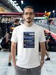 تیشرت طرح رادیو فرمول یک | F1 Team Radio  BOX BOX! — RADIO CHECK  تیشرت طرح رادیو فرمول یک برای طرفداران لحظاتی طراحی شده که در کنار صدای موتور و هیجان مسابقه، یکی از جذاب‌ترین بخش‌های فرمول یک را می‌سازند: Team Radio.  از یک دستور ساده مثل «Box, box!» گرفته تا اعتراض‌های عجیب، فریادهای هیجانی، درخواست استراتژی و دیالوگ‌های فراموش‌نشدنی راننده‌ها و مهندسان مسابقه، رادیوی تیمی بخشی جدانشدنی از دنیای مدرن فرمول یک است.  اگر برای شما F1 فقط دیدن ماشین‌ها نیست و از شنیدن رادیوهای راننده‌ها در طول مسابقه لذت می‌برید، این تیشرت دقیقاً برای همین علاقه طراحی شده است.  🏎️ Team Radio؛ صدای واقعی مسابقه  در فرمول یک، راننده در طول مسابقه دائماً با مهندس مسابقه و تیم خودش در ارتباط است.  در چند ثانیه ممکن است درباره لاستیک‌ها، استراتژی، وضعیت خودرو، ترافیک، فاصله با رقبا، پیت‌استاپ و شرایط پیست صحبت شود.  اما چیزی که Team Radio را برای هواداران جذاب‌تر می‌کند، فقط اطلاعات فنی نیست.  گاهی یک جمله کوتاه می‌تواند تمام احساسات یک مسابقه را نشان دهد:  خشم، استرس، ناامیدی، هیجان، خوشحالی و حتی شوخی.  🎙️ وقتی راننده میکروفون را باز می‌کند...  یکی از جذاب‌ترین لحظات برای طرفداران فرمول یک زمانی است که صدای رادیوی راننده وارد پخش مسابقه می‌شود.  ممکن است راننده آرام و دقیق درباره لاستیک صحبت کند؛ چند دور بعد عصبانی شود؛ بعد از یک سبقت فریاد بزند یا پس از یک پیروزی از خوشحالی نتواند احساساتش را کنترل کند.  همین لحظات غیرقابل‌پیش‌بینی باعث شده F1 Team Radio به بخشی از فرهنگ هواداری فرمول یک تبدیل شود.  🔥 BOX, BOX!  اگر فرمول یک را دنبال کرده باشید، احتمالاً بارها عبارت معروف:  BOX, BOX!  را شنیده‌اید.  این یکی از شناخته‌شده‌ترین فرمان‌های رادیویی در F1 است؛ دستوری برای ورود راننده به Pit Lane و انجام پیت‌استاپ.  اما Team Radio فقط درباره پیت‌استاپ نیست.  گاهی یک جمله ساده از طرف مهندس می‌تواند استراتژی کل مسابقه را تغییر دهد و گاهی یک واکنش چندکلمه‌ای از راننده به یکی از ماندگارترین لحظات آخر هفته مسابقه تبدیل می‌شود.  🏁 برای طرفداران واقعی فرمول یک  تیشرت F1 Team Radio (1) برای کسانی است که جزئیات کوچک اما مهم این ورزش را دوست دارند.  مناسب برای:  طرفداران Formula 1  علاقه‌مندان به F1 Team Radio  طرفداران مسابقات اتومبیل‌رانی  علاقه‌مندان به Motorsport  طرفداران راننده‌های F1  علاقه‌مندان به استراتژی و مهندسی مسابقه  گیمرهای Racing  طرفداران F1 و Racing Culture  🎧 صدای پشت فرمان  فرمول یک فقط صدای موتور نیست.  پشت هر دور سریع، مجموعه‌ای از تصمیم‌ها، محاسبات و ارتباطات قرار دارد.  راننده در سرعت‌های بسیار بالا باید خودرو را کنترل کند و هم‌زمان اطلاعاتی را از تیم دریافت کند؛ از وضعیت لاستیک گرفته تا فاصله با رقیب و زمان مناسب برای پیت‌استاپ.  Team Radio بخشی از همین ارتباط است؛ صدایی که اجازه می‌دهد برای چند لحظه وارد کابین راننده شویم و فشار واقعی مسابقه را بشنویم.  👕 جنس و کیفیت تیشرت  برای تولید این محصول از پارچه نخ پنبه خالص استفاده شده است؛ پارچه‌ای نرم، راحت و مناسب استفاده روزمره.  این تیشرت را می‌توانید با شلوار جین، مشکی یا کارگو و همچنین کت یا هودی ترکیب کنید و یک استایل Racing / Streetwear بسازید.  🎨 چاپ طرح F1 Team Radio  طرح رادیو فرمول یک (1) با دقت روی پارچه اجرا شده تا جزئیات گرافیکی آن به خوبی دیده شود.  برای حفظ کیفیت چاپ و افزایش دوام آن، توصیه می‌شود تیشرت را با آب سرد و طبق اصول صحیح شستشو بشویید و از روش‌های نامناسب شستشو که ممکن است به چاپ آسیب بزند، خودداری کنید.  🏎️ برای کسانی که صدای مسابقه را می‌شناسند  ممکن است یک نفر فقط صدای موتور را بشنود.  اما یک طرفدار فرمول یک می‌داند که وقتی صدای رادیو می‌آید، ممکن است اتفاق مهمی در راه باشد.  یک دستور پیت‌استاپ.  یک هشدار.  یک اعتراض.  یک استراتژی جدید.  یا شاید جمله‌ای که چند ساعت بعد همه طرفداران درباره‌اش صحبت کنند.  تیشرت F1 Team Radio (1) ادای احترامی است به همین بخش جذاب و غیرقابل‌پیش‌بینی دنیای فرمول یک.  Lights out. Radio on.  📏 سایزبندی  تیشرت طرح F1 Team Radio (1) در سایزهای استاندارد زیر ارائه می‌شود:  L  XL  XXL  برای انتخاب دقیق سایز، قبل از ثبت سفارش حتماً جدول سایزبندی را بررسی کنید.  🎨 رنگ‌بندی  این محصول در رنگ‌های موجود در صفحه محصول قابل سفارش است.  هنگام ثبت سفارش، رنگ و سایز موردنظر خود را انتخاب کنید.  📦 ارسال رایگان به سراسر ایران  ارسال این محصول به تمام نقاط ایران رایگان است.  🛒 چرا تیشرت طرح رادیو فرمول یک (1)؟  طراحی با الهام از F1 Team Radio  مناسب طرفداران واقعی فرمول یک  الهام‌گرفته از ارتباط راننده و مهندس مسابقه  مناسب علاقه‌مندان به Motorsport و Racing  انتخابی متفاوت برای طرفداران F1  مناسب استایل Racing و Streetwear  پارچه نخ پنبه خالص  چاپ با اجرای دقیق  مناسب استفاده روزمره  سایزبندی L / XL / XXL  ارسال رایگان به سراسر ایران  مشخصات محصول  ویژگی  مشخصات  نام محصول  تیشرت طرح رادیو فرمول یک (1)  دسته‌بندی  فرمول یک  جنس  نخ پنبه خالص  سایز  L / XL / XXL  سبک  F1 / Team Radio / Motorsport  الهام طراحی  رادیوهای راننده‌ها و مهندسان F1  مناسب برای  طرفداران Formula 1 و Motorsport  ارسال  رایگان به سراسر ایران  کلمات کلیدی مرتبط  تیشرت فرمول یک، تیشرت F1، تیشرت طرح فرمول یک، تیشرت رادیو فرمول یک، تیشرت F1 Team Radio، تیشرت Team Radio، تیشرت رادیویی F1، تیشرت راننده فرمول یک، تیشرت Motorsport، تیشرت موتوراسپرت، تیشرت Racing، تیشرت مسابقه‌ای، تیشرت Formula 1، تیشرت F1 Fan، تیشرت طرفداران فرمول یک، تیشرت Box Box، تیشرت Box Box Box، تیشرت Pit Stop، تیشرت Racing Culture، تیشرت گرافیکی فرمول یک، تیشرت طرح F1، تیشرت ماشین مسابقه، لباس فرمول یک، تیشرت مخصوص طرفداران F1، تیشرت استایل Racing