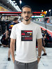 تیشرت طرح رادیو فرمول یک | F1 Team Radio  BOX BOX! — RADIO CHECK  تیشرت طرح رادیو فرمول یک برای طرفداران لحظاتی طراحی شده که در کنار صدای موتور و هیجان مسابقه، یکی از جذاب‌ترین بخش‌های فرمول یک را می‌سازند: Team Radio.  از یک دستور ساده مثل «Box, box!» گرفته تا اعتراض‌های عجیب، فریادهای هیجانی، درخواست استراتژی و دیالوگ‌های فراموش‌نشدنی راننده‌ها و مهندسان مسابقه، رادیوی تیمی بخشی جدانشدنی از دنیای مدرن فرمول یک است.  اگر برای شما F1 فقط دیدن ماشین‌ها نیست و از شنیدن رادیوهای راننده‌ها در طول مسابقه لذت می‌برید، این تیشرت دقیقاً برای همین علاقه طراحی شده است.  🏎️ Team Radio؛ صدای واقعی مسابقه  در فرمول یک، راننده در طول مسابقه دائماً با مهندس مسابقه و تیم خودش در ارتباط است.  در چند ثانیه ممکن است درباره لاستیک‌ها، استراتژی، وضعیت خودرو، ترافیک، فاصله با رقبا، پیت‌استاپ و شرایط پیست صحبت شود.  اما چیزی که Team Radio را برای هواداران جذاب‌تر می‌کند، فقط اطلاعات فنی نیست.  گاهی یک جمله کوتاه می‌تواند تمام احساسات یک مسابقه را نشان دهد:  خشم، استرس، ناامیدی، هیجان، خوشحالی و حتی شوخی.  🎙️ وقتی راننده میکروفون را باز می‌کند...  یکی از جذاب‌ترین لحظات برای طرفداران فرمول یک زمانی است که صدای رادیوی راننده وارد پخش مسابقه می‌شود.  ممکن است راننده آرام و دقیق درباره لاستیک صحبت کند؛ چند دور بعد عصبانی شود؛ بعد از یک سبقت فریاد بزند یا پس از یک پیروزی از خوشحالی نتواند احساساتش را کنترل کند.  همین لحظات غیرقابل‌پیش‌بینی باعث شده F1 Team Radio به بخشی از فرهنگ هواداری فرمول یک تبدیل شود.  🔥 BOX, BOX!  اگر فرمول یک را دنبال کرده باشید، احتمالاً بارها عبارت معروف:  BOX, BOX!  را شنیده‌اید.  این یکی از شناخته‌شده‌ترین فرمان‌های رادیویی در F1 است؛ دستوری برای ورود راننده به Pit Lane و انجام پیت‌استاپ.  اما Team Radio فقط درباره پیت‌استاپ نیست.  گاهی یک جمله ساده از طرف مهندس می‌تواند استراتژی کل مسابقه را تغییر دهد و گاهی یک واکنش چندکلمه‌ای از راننده به یکی از ماندگارترین لحظات آخر هفته مسابقه تبدیل می‌شود.  🏁 برای طرفداران واقعی فرمول یک  تیشرت F1 Team Radio (1) برای کسانی است که جزئیات کوچک اما مهم این ورزش را دوست دارند.  مناسب برای:  طرفداران Formula 1  علاقه‌مندان به F1 Team Radio  طرفداران مسابقات اتومبیل‌رانی  علاقه‌مندان به Motorsport  طرفداران راننده‌های F1  علاقه‌مندان به استراتژی و مهندسی مسابقه  گیمرهای Racing  طرفداران F1 و Racing Culture  🎧 صدای پشت فرمان  فرمول یک فقط صدای موتور نیست.  پشت هر دور سریع، مجموعه‌ای از تصمیم‌ها، محاسبات و ارتباطات قرار دارد.  راننده در سرعت‌های بسیار بالا باید خودرو را کنترل کند و هم‌زمان اطلاعاتی را از تیم دریافت کند؛ از وضعیت لاستیک گرفته تا فاصله با رقیب و زمان مناسب برای پیت‌استاپ.  Team Radio بخشی از همین ارتباط است؛ صدایی که اجازه می‌دهد برای چند لحظه وارد کابین راننده شویم و فشار واقعی مسابقه را بشنویم.  👕 جنس و کیفیت تیشرت  برای تولید این محصول از پارچه نخ پنبه خالص استفاده شده است؛ پارچه‌ای نرم، راحت و مناسب استفاده روزمره.  این تیشرت را می‌توانید با شلوار جین، مشکی یا کارگو و همچنین کت یا هودی ترکیب کنید و یک استایل Racing / Streetwear بسازید.  🎨 چاپ طرح F1 Team Radio  طرح رادیو فرمول یک (1) با دقت روی پارچه اجرا شده تا جزئیات گرافیکی آن به خوبی دیده شود.  برای حفظ کیفیت چاپ و افزایش دوام آن، توصیه می‌شود تیشرت را با آب سرد و طبق اصول صحیح شستشو بشویید و از روش‌های نامناسب شستشو که ممکن است به چاپ آسیب بزند، خودداری کنید.  🏎️ برای کسانی که صدای مسابقه را می‌شناسند  ممکن است یک نفر فقط صدای موتور را بشنود.  اما یک طرفدار فرمول یک می‌داند که وقتی صدای رادیو می‌آید، ممکن است اتفاق مهمی در راه باشد.  یک دستور پیت‌استاپ.  یک هشدار.  یک اعتراض.  یک استراتژی جدید.  یا شاید جمله‌ای که چند ساعت بعد همه طرفداران درباره‌اش صحبت کنند.  تیشرت F1 Team Radio (1) ادای احترامی است به همین بخش جذاب و غیرقابل‌پیش‌بینی دنیای فرمول یک.  Lights out. Radio on.  📏 سایزبندی  تیشرت طرح F1 Team Radio (1) در سایزهای استاندارد زیر ارائه می‌شود:  L  XL  XXL  برای انتخاب دقیق سایز، قبل از ثبت سفارش حتماً جدول سایزبندی را بررسی کنید.  🎨 رنگ‌بندی  این محصول در رنگ‌های موجود در صفحه محصول قابل سفارش است.  هنگام ثبت سفارش، رنگ و سایز موردنظر خود را انتخاب کنید.  📦 ارسال رایگان به سراسر ایران  ارسال این محصول به تمام نقاط ایران رایگان است.  🛒 چرا تیشرت طرح رادیو فرمول یک (1)؟  طراحی با الهام از F1 Team Radio  مناسب طرفداران واقعی فرمول یک  الهام‌گرفته از ارتباط راننده و مهندس مسابقه  مناسب علاقه‌مندان به Motorsport و Racing  انتخابی متفاوت برای طرفداران F1  مناسب استایل Racing و Streetwear  پارچه نخ پنبه خالص  چاپ با اجرای دقیق  مناسب استفاده روزمره  سایزبندی L / XL / XXL  ارسال رایگان به سراسر ایران  مشخصات محصول  ویژگی  مشخصات  نام محصول  تیشرت طرح رادیو فرمول یک (1)  دسته‌بندی  فرمول یک  جنس  نخ پنبه خالص  سایز  L / XL / XXL  سبک  F1 / Team Radio / Motorsport  الهام طراحی  رادیوهای راننده‌ها و مهندسان F1  مناسب برای  طرفداران Formula 1 و Motorsport  ارسال  رایگان به سراسر ایران  کلمات کلیدی مرتبط  تیشرت فرمول یک، تیشرت F1، تیشرت طرح فرمول یک، تیشرت رادیو فرمول یک، تیشرت F1 Team Radio، تیشرت Team Radio، تیشرت رادیویی F1، تیشرت راننده فرمول یک، تیشرت Motorsport، تیشرت موتوراسپرت، تیشرت Racing، تیشرت مسابقه‌ای، تیشرت Formula 1، تیشرت F1 Fan، تیشرت طرفداران فرمول یک، تیشرت Box Box، تیشرت Box Box Box، تیشرت Pit Stop، تیشرت Racing Culture، تیشرت گرافیکی فرمول یک، تیشرت طرح F1، تیشرت ماشین مسابقه، لباس فرمول یک، تیشرت مخصوص طرفداران F1، تیشرت استایل Racing