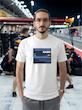 تیشرت طرح رادیو فرمول یک | F1 Team Radio  BOX BOX! — RADIO CHECK  تیشرت طرح رادیو فرمول یک برای طرفداران لحظاتی طراحی شده که در کنار صدای موتور و هیجان مسابقه، یکی از جذاب‌ترین بخش‌های فرمول یک را می‌سازند: Team Radio.  از یک دستور ساده مثل «Box, box!» گرفته تا اعتراض‌های عجیب، فریادهای هیجانی، درخواست استراتژی و دیالوگ‌های فراموش‌نشدنی راننده‌ها و مهندسان مسابقه، رادیوی تیمی بخشی جدانشدنی از دنیای مدرن فرمول یک است.  اگر برای شما F1 فقط دیدن ماشین‌ها نیست و از شنیدن رادیوهای راننده‌ها در طول مسابقه لذت می‌برید، این تیشرت دقیقاً برای همین علاقه طراحی شده است.  🏎️ Team Radio؛ صدای واقعی مسابقه  در فرمول یک، راننده در طول مسابقه دائماً با مهندس مسابقه و تیم خودش در ارتباط است.  در چند ثانیه ممکن است درباره لاستیک‌ها، استراتژی، وضعیت خودرو، ترافیک، فاصله با رقبا، پیت‌استاپ و شرایط پیست صحبت شود.  اما چیزی که Team Radio را برای هواداران جذاب‌تر می‌کند، فقط اطلاعات فنی نیست.  گاهی یک جمله کوتاه می‌تواند تمام احساسات یک مسابقه را نشان دهد:  خشم، استرس، ناامیدی، هیجان، خوشحالی و حتی شوخی.  🎙️ وقتی راننده میکروفون را باز می‌کند...  یکی از جذاب‌ترین لحظات برای طرفداران فرمول یک زمانی است که صدای رادیوی راننده وارد پخش مسابقه می‌شود.  ممکن است راننده آرام و دقیق درباره لاستیک صحبت کند؛ چند دور بعد عصبانی شود؛ بعد از یک سبقت فریاد بزند یا پس از یک پیروزی از خوشحالی نتواند احساساتش را کنترل کند.  همین لحظات غیرقابل‌پیش‌بینی باعث شده F1 Team Radio به بخشی از فرهنگ هواداری فرمول یک تبدیل شود.  🔥 BOX, BOX!  اگر فرمول یک را دنبال کرده باشید، احتمالاً بارها عبارت معروف:  BOX, BOX!  را شنیده‌اید.  این یکی از شناخته‌شده‌ترین فرمان‌های رادیویی در F1 است؛ دستوری برای ورود راننده به Pit Lane و انجام پیت‌استاپ.  اما Team Radio فقط درباره پیت‌استاپ نیست.  گاهی یک جمله ساده از طرف مهندس می‌تواند استراتژی کل مسابقه را تغییر دهد و گاهی یک واکنش چندکلمه‌ای از راننده به یکی از ماندگارترین لحظات آخر هفته مسابقه تبدیل می‌شود.  🏁 برای طرفداران واقعی فرمول یک  تیشرت F1 Team Radio (1) برای کسانی است که جزئیات کوچک اما مهم این ورزش را دوست دارند.  مناسب برای:  طرفداران Formula 1  علاقه‌مندان به F1 Team Radio  طرفداران مسابقات اتومبیل‌رانی  علاقه‌مندان به Motorsport  طرفداران راننده‌های F1  علاقه‌مندان به استراتژی و مهندسی مسابقه  گیمرهای Racing  طرفداران F1 و Racing Culture  🎧 صدای پشت فرمان  فرمول یک فقط صدای موتور نیست.  پشت هر دور سریع، مجموعه‌ای از تصمیم‌ها، محاسبات و ارتباطات قرار دارد.  راننده در سرعت‌های بسیار بالا باید خودرو را کنترل کند و هم‌زمان اطلاعاتی را از تیم دریافت کند؛ از وضعیت لاستیک گرفته تا فاصله با رقیب و زمان مناسب برای پیت‌استاپ.  Team Radio بخشی از همین ارتباط است؛ صدایی که اجازه می‌دهد برای چند لحظه وارد کابین راننده شویم و فشار واقعی مسابقه را بشنویم.  👕 جنس و کیفیت تیشرت  برای تولید این محصول از پارچه نخ پنبه خالص استفاده شده است؛ پارچه‌ای نرم، راحت و مناسب استفاده روزمره.  این تیشرت را می‌توانید با شلوار جین، مشکی یا کارگو و همچنین کت یا هودی ترکیب کنید و یک استایل Racing / Streetwear بسازید.  🎨 چاپ طرح F1 Team Radio  طرح رادیو فرمول یک (1) با دقت روی پارچه اجرا شده تا جزئیات گرافیکی آن به خوبی دیده شود.  برای حفظ کیفیت چاپ و افزایش دوام آن، توصیه می‌شود تیشرت را با آب سرد و طبق اصول صحیح شستشو بشویید و از روش‌های نامناسب شستشو که ممکن است به چاپ آسیب بزند، خودداری کنید.  🏎️ برای کسانی که صدای مسابقه را می‌شناسند  ممکن است یک نفر فقط صدای موتور را بشنود.  اما یک طرفدار فرمول یک می‌داند که وقتی صدای رادیو می‌آید، ممکن است اتفاق مهمی در راه باشد.  یک دستور پیت‌استاپ.  یک هشدار.  یک اعتراض.  یک استراتژی جدید.  یا شاید جمله‌ای که چند ساعت بعد همه طرفداران درباره‌اش صحبت کنند.  تیشرت F1 Team Radio (1) ادای احترامی است به همین بخش جذاب و غیرقابل‌پیش‌بینی دنیای فرمول یک.  Lights out. Radio on.  📏 سایزبندی  تیشرت طرح F1 Team Radio (1) در سایزهای استاندارد زیر ارائه می‌شود:  L  XL  XXL  برای انتخاب دقیق سایز، قبل از ثبت سفارش حتماً جدول سایزبندی را بررسی کنید.  🎨 رنگ‌بندی  این محصول در رنگ‌های موجود در صفحه محصول قابل سفارش است.  هنگام ثبت سفارش، رنگ و سایز موردنظر خود را انتخاب کنید.  📦 ارسال رایگان به سراسر ایران  ارسال این محصول به تمام نقاط ایران رایگان است.  🛒 چرا تیشرت طرح رادیو فرمول یک (1)؟  طراحی با الهام از F1 Team Radio  مناسب طرفداران واقعی فرمول یک  الهام‌گرفته از ارتباط راننده و مهندس مسابقه  مناسب علاقه‌مندان به Motorsport و Racing  انتخابی متفاوت برای طرفداران F1  مناسب استایل Racing و Streetwear  پارچه نخ پنبه خالص  چاپ با اجرای دقیق  مناسب استفاده روزمره  سایزبندی L / XL / XXL  ارسال رایگان به سراسر ایران  مشخصات محصول  ویژگی  مشخصات  نام محصول  تیشرت طرح رادیو فرمول یک (1)  دسته‌بندی  فرمول یک  جنس  نخ پنبه خالص  سایز  L / XL / XXL  سبک  F1 / Team Radio / Motorsport  الهام طراحی  رادیوهای راننده‌ها و مهندسان F1  مناسب برای  طرفداران Formula 1 و Motorsport  ارسال  رایگان به سراسر ایران  کلمات کلیدی مرتبط  تیشرت فرمول یک، تیشرت F1، تیشرت طرح فرمول یک، تیشرت رادیو فرمول یک، تیشرت F1 Team Radio، تیشرت Team Radio، تیشرت رادیویی F1، تیشرت راننده فرمول یک، تیشرت Motorsport، تیشرت موتوراسپرت، تیشرت Racing، تیشرت مسابقه‌ای، تیشرت Formula 1، تیشرت F1 Fan، تیشرت طرفداران فرمول یک، تیشرت Box Box، تیشرت Box Box Box، تیشرت Pit Stop، تیشرت Racing Culture، تیشرت گرافیکی فرمول یک، تیشرت طرح F1، تیشرت ماشین مسابقه، لباس فرمول یک، تیشرت مخصوص طرفداران F1، تیشرت استایل Racing