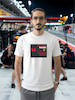 تیشرت طرح رادیو فرمول یک | F1 Team Radio  BOX BOX! — RADIO CHECK  تیشرت طرح رادیو فرمول یک برای طرفداران لحظاتی طراحی شده که در کنار صدای موتور و هیجان مسابقه، یکی از جذاب‌ترین بخش‌های فرمول یک را می‌سازند: Team Radio.  از یک دستور ساده مثل «Box, box!» گرفته تا اعتراض‌های عجیب، فریادهای هیجانی، درخواست استراتژی و دیالوگ‌های فراموش‌نشدنی راننده‌ها و مهندسان مسابقه، رادیوی تیمی بخشی جدانشدنی از دنیای مدرن فرمول یک است.  اگر برای شما F1 فقط دیدن ماشین‌ها نیست و از شنیدن رادیوهای راننده‌ها در طول مسابقه لذت می‌برید، این تیشرت دقیقاً برای همین علاقه طراحی شده است.  🏎️ Team Radio؛ صدای واقعی مسابقه  در فرمول یک، راننده در طول مسابقه دائماً با مهندس مسابقه و تیم خودش در ارتباط است.  در چند ثانیه ممکن است درباره لاستیک‌ها، استراتژی، وضعیت خودرو، ترافیک، فاصله با رقبا، پیت‌استاپ و شرایط پیست صحبت شود.  اما چیزی که Team Radio را برای هواداران جذاب‌تر می‌کند، فقط اطلاعات فنی نیست.  گاهی یک جمله کوتاه می‌تواند تمام احساسات یک مسابقه را نشان دهد:  خشم، استرس، ناامیدی، هیجان، خوشحالی و حتی شوخی.  🎙️ وقتی راننده میکروفون را باز می‌کند...  یکی از جذاب‌ترین لحظات برای طرفداران فرمول یک زمانی است که صدای رادیوی راننده وارد پخش مسابقه می‌شود.  ممکن است راننده آرام و دقیق درباره لاستیک صحبت کند؛ چند دور بعد عصبانی شود؛ بعد از یک سبقت فریاد بزند یا پس از یک پیروزی از خوشحالی نتواند احساساتش را کنترل کند.  همین لحظات غیرقابل‌پیش‌بینی باعث شده F1 Team Radio به بخشی از فرهنگ هواداری فرمول یک تبدیل شود.  🔥 BOX, BOX!  اگر فرمول یک را دنبال کرده باشید، احتمالاً بارها عبارت معروف:  BOX, BOX!  را شنیده‌اید.  این یکی از شناخته‌شده‌ترین فرمان‌های رادیویی در F1 است؛ دستوری برای ورود راننده به Pit Lane و انجام پیت‌استاپ.  اما Team Radio فقط درباره پیت‌استاپ نیست.  گاهی یک جمله ساده از طرف مهندس می‌تواند استراتژی کل مسابقه را تغییر دهد و گاهی یک واکنش چندکلمه‌ای از راننده به یکی از ماندگارترین لحظات آخر هفته مسابقه تبدیل می‌شود.  🏁 برای طرفداران واقعی فرمول یک  تیشرت F1 Team Radio (1) برای کسانی است که جزئیات کوچک اما مهم این ورزش را دوست دارند.  مناسب برای:  طرفداران Formula 1  علاقه‌مندان به F1 Team Radio  طرفداران مسابقات اتومبیل‌رانی  علاقه‌مندان به Motorsport  طرفداران راننده‌های F1  علاقه‌مندان به استراتژی و مهندسی مسابقه  گیمرهای Racing  طرفداران F1 و Racing Culture  🎧 صدای پشت فرمان  فرمول یک فقط صدای موتور نیست.  پشت هر دور سریع، مجموعه‌ای از تصمیم‌ها، محاسبات و ارتباطات قرار دارد.  راننده در سرعت‌های بسیار بالا باید خودرو را کنترل کند و هم‌زمان اطلاعاتی را از تیم دریافت کند؛ از وضعیت لاستیک گرفته تا فاصله با رقیب و زمان مناسب برای پیت‌استاپ.  Team Radio بخشی از همین ارتباط است؛ صدایی که اجازه می‌دهد برای چند لحظه وارد کابین راننده شویم و فشار واقعی مسابقه را بشنویم.  👕 جنس و کیفیت تیشرت  برای تولید این محصول از پارچه نخ پنبه خالص استفاده شده است؛ پارچه‌ای نرم، راحت و مناسب استفاده روزمره.  این تیشرت را می‌توانید با شلوار جین، مشکی یا کارگو و همچنین کت یا هودی ترکیب کنید و یک استایل Racing / Streetwear بسازید.  🎨 چاپ طرح F1 Team Radio  طرح رادیو فرمول یک (1) با دقت روی پارچه اجرا شده تا جزئیات گرافیکی آن به خوبی دیده شود.  برای حفظ کیفیت چاپ و افزایش دوام آن، توصیه می‌شود تیشرت را با آب سرد و طبق اصول صحیح شستشو بشویید و از روش‌های نامناسب شستشو که ممکن است به چاپ آسیب بزند، خودداری کنید.  🏎️ برای کسانی که صدای مسابقه را می‌شناسند  ممکن است یک نفر فقط صدای موتور را بشنود.  اما یک طرفدار فرمول یک می‌داند که وقتی صدای رادیو می‌آید، ممکن است اتفاق مهمی در راه باشد.  یک دستور پیت‌استاپ.  یک هشدار.  یک اعتراض.  یک استراتژی جدید.  یا شاید جمله‌ای که چند ساعت بعد همه طرفداران درباره‌اش صحبت کنند.  تیشرت F1 Team Radio (1) ادای احترامی است به همین بخش جذاب و غیرقابل‌پیش‌بینی دنیای فرمول یک.  Lights out. Radio on.  📏 سایزبندی  تیشرت طرح F1 Team Radio (1) در سایزهای استاندارد زیر ارائه می‌شود:  L  XL  XXL  برای انتخاب دقیق سایز، قبل از ثبت سفارش حتماً جدول سایزبندی را بررسی کنید.  🎨 رنگ‌بندی  این محصول در رنگ‌های موجود در صفحه محصول قابل سفارش است.  هنگام ثبت سفارش، رنگ و سایز موردنظر خود را انتخاب کنید.  📦 ارسال رایگان به سراسر ایران  ارسال این محصول به تمام نقاط ایران رایگان است.  🛒 چرا تیشرت طرح رادیو فرمول یک (1)؟  طراحی با الهام از F1 Team Radio  مناسب طرفداران واقعی فرمول یک  الهام‌گرفته از ارتباط راننده و مهندس مسابقه  مناسب علاقه‌مندان به Motorsport و Racing  انتخابی متفاوت برای طرفداران F1  مناسب استایل Racing و Streetwear  پارچه نخ پنبه خالص  چاپ با اجرای دقیق  مناسب استفاده روزمره  سایزبندی L / XL / XXL  ارسال رایگان به سراسر ایران  مشخصات محصول  ویژگی  مشخصات  نام محصول  تیشرت طرح رادیو فرمول یک (1)  دسته‌بندی  فرمول یک  جنس  نخ پنبه خالص  سایز  L / XL / XXL  سبک  F1 / Team Radio / Motorsport  الهام طراحی  رادیوهای راننده‌ها و مهندسان F1  مناسب برای  طرفداران Formula 1 و Motorsport  ارسال  رایگان به سراسر ایران  کلمات کلیدی مرتبط  تیشرت فرمول یک، تیشرت F1، تیشرت طرح فرمول یک، تیشرت رادیو فرمول یک، تیشرت F1 Team Radio، تیشرت Team Radio، تیشرت رادیویی F1، تیشرت راننده فرمول یک، تیشرت Motorsport، تیشرت موتوراسپرت، تیشرت Racing، تیشرت مسابقه‌ای، تیشرت Formula 1، تیشرت F1 Fan، تیشرت طرفداران فرمول یک، تیشرت Box Box، تیشرت Box Box Box، تیشرت Pit Stop، تیشرت Racing Culture، تیشرت گرافیکی فرمول یک، تیشرت طرح F1، تیشرت ماشین مسابقه، لباس فرمول یک، تیشرت مخصوص طرفداران F1، تیشرت استایل Racing