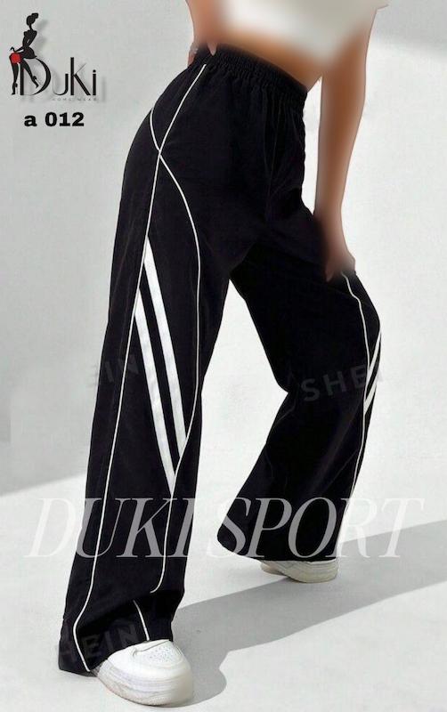 شلوار بگ جیبدار زنانه دو خط مغزی و نوار خور مشکی فری سایز کد  a012