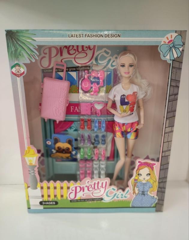 باربی مفصلی بلوند با ست کفش و چمدان 