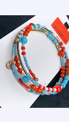 دستبند النگویی با ترکیب رنگ نارنجی آبی 