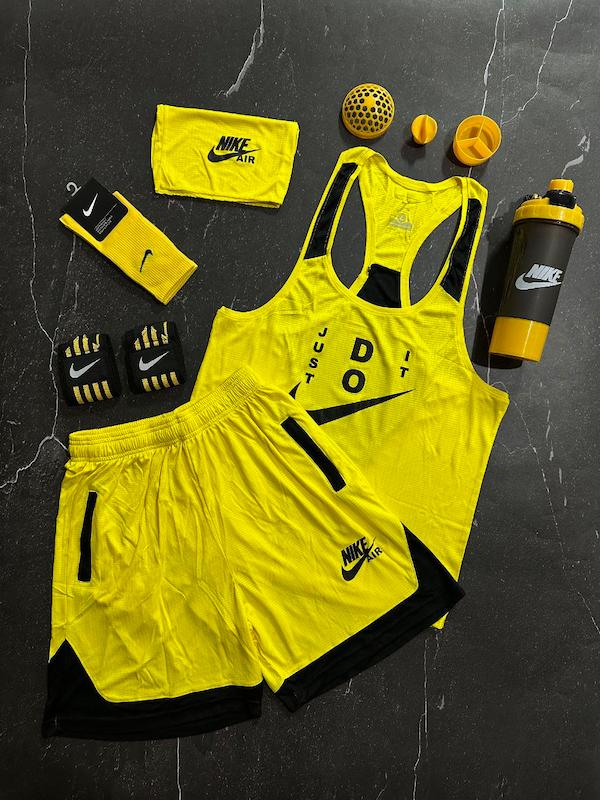 پکیج کد E1695 شامل رکابی قهرمانی + شلوارک + اسکارف + شیکر + مچ بند + جوراب با تم زرد مشکی 💛🖤