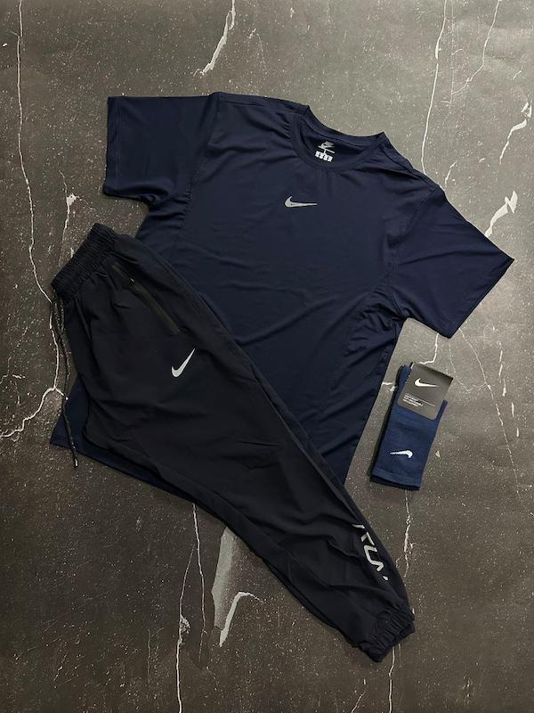 پکیج کد E1741 شامل تیشرت + شلوار دمپاکش + جوراب ساقدار نایکب با تم سرمه ای 😍🔥