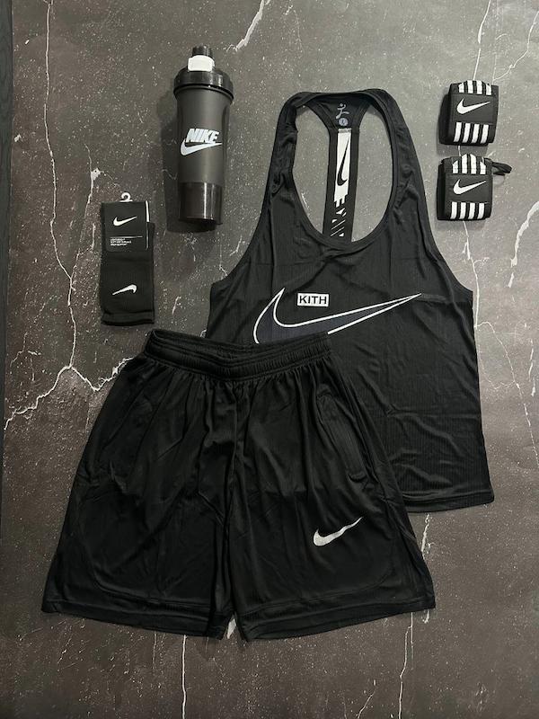 پکیج کد E1761 شامل رکابی پشت کش + شلوارک + جوراب ساقدار + مچ بند چسب نانو + شیکر دو تیکه با تم مشکی 🖤🤌🏻