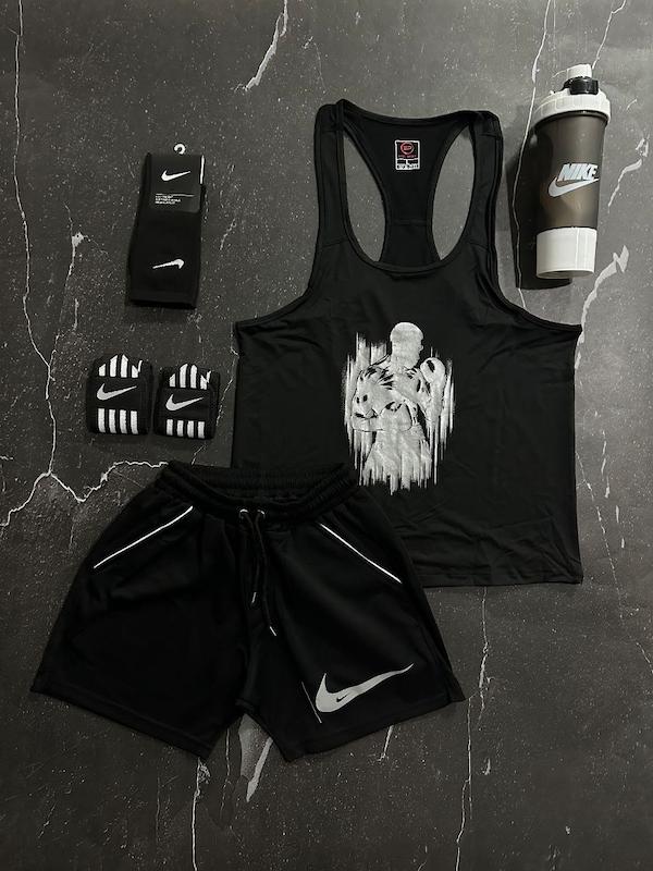 پکیج کد E1769 شامل رکابی + شلوارک + جوراب ساقدار + شیکر دو تیکه + مچ بند چسب نانو با تم مشکی 🖤