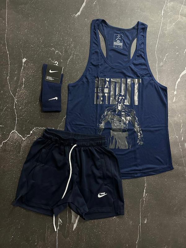 پکیج کد E1785 شامل رکابی قهرمانی + شلوارک کوتاه + جوراب ساقدار با تم سرمه ای