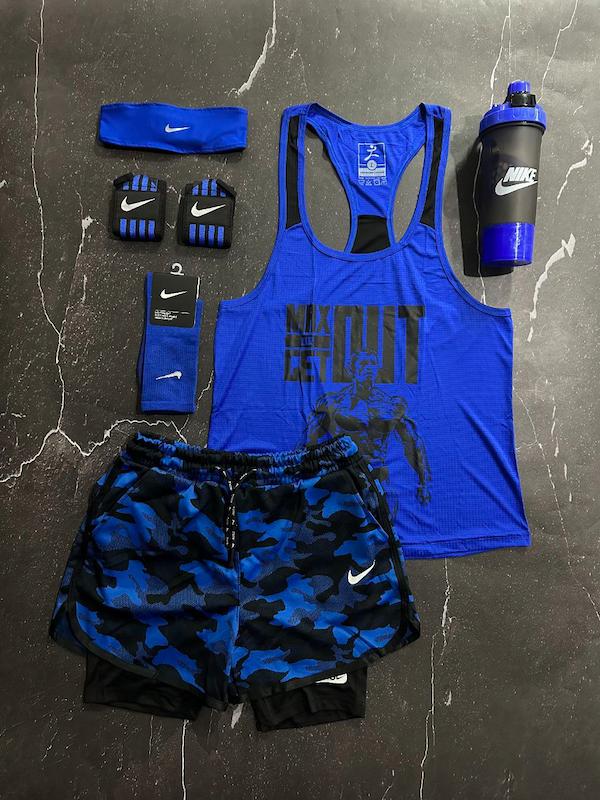 پکیج کد E1781 شامل رکابی قهرمانی + شلوارک چریکی کشاله دار + جوراب ساقدار + شیکر دو تیکه + مچ بند چسب نانو + هدبند با تم آبی 💙🔥