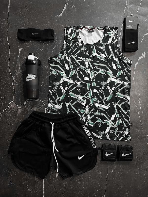 پکیج کد E1814 شامل رکابی حلقه ای + شلوارک غواصی + جوراب ساقدار + شیکر دو تیکه + مچ بند چسب نانو + هدبند با تم مشکی 🖤🔥