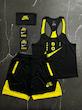 پکیج کد S2808 شامل رکابی قهرمانی + شلوارک + اسکارف + مچبند با تم مشکی زرد