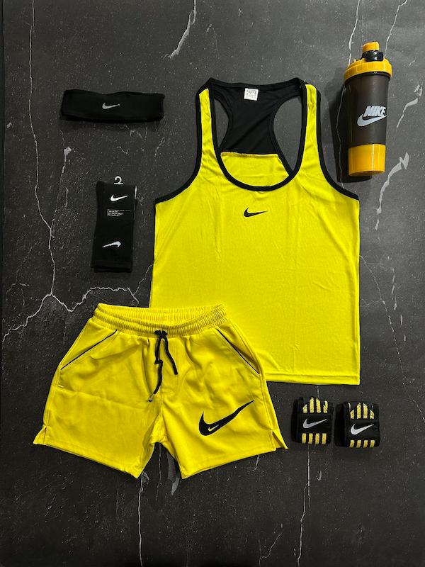 پکیج کد E1820 شامل رکابی قهرمانی + شلوارک غواصی + جوراب ساقدار + شیکر دو تیکه + مچ بند چسب نانو + هدبند با تم زرد 💛