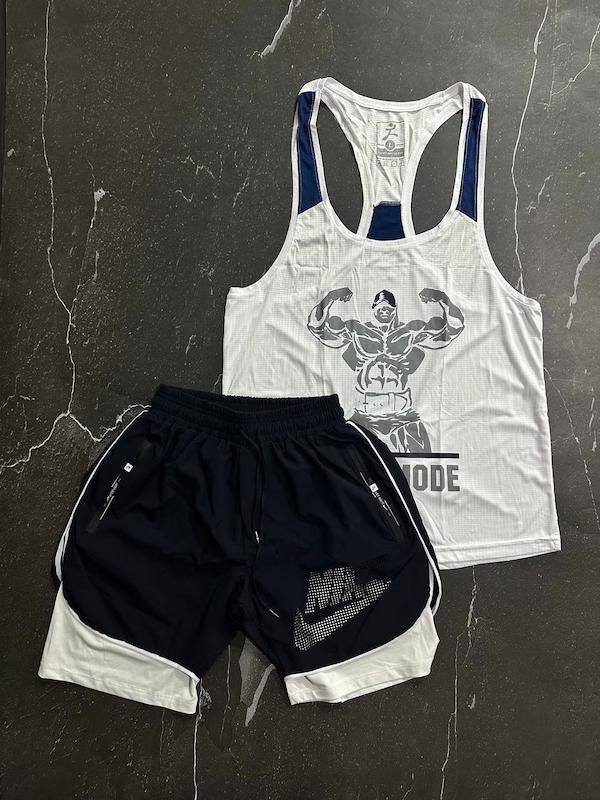 پکیج کد S2824 شامل رکابی قهرمانی + شلوارک کشاله دار با تم سفید سرمه ای