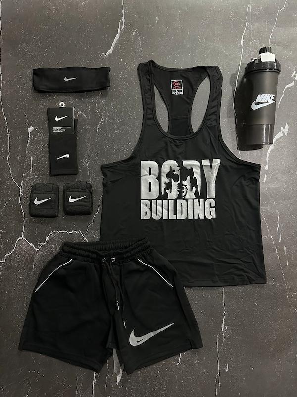 پکیج کد E1825 شامل رکابی قهرمانی + شلوارک غواصی + جوراب ساقدار + شیکر دو تیکه + مچ بند چسب نانو + هدبند با تم فول مشکی 🖤🔥