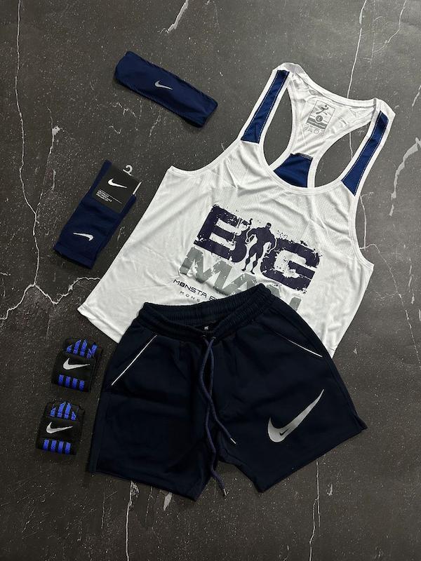 پکیج کد E1834 شامل رکابی قهرمانی + شلوارک غواصی + جوراب ساقدار + مچ بند چسب نانو + هدبند با تم سفید سرمه ای 🤍💙