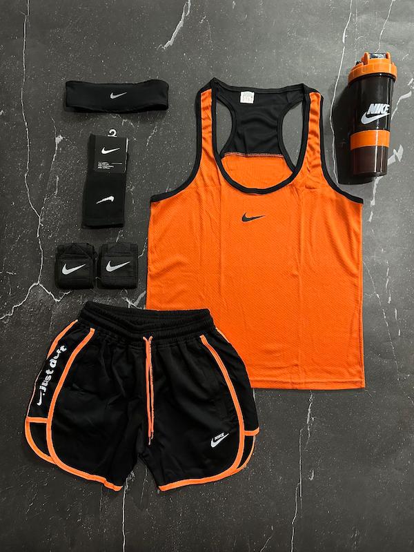 پکیج کد E1838 شامل رکابی قهرمانی + شلوارک غواصی + جوراب ساقدار + شیکر دو تیکه + مچ بند چسب نانو + هدبند با تم نارنجی 🧡🔥