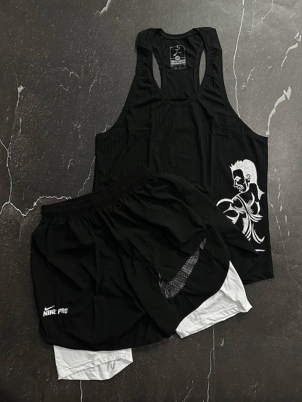 پکیج کد S2865 شامل رکابی + شلوارک کشاله دار با تم مشکی سفید 3XL