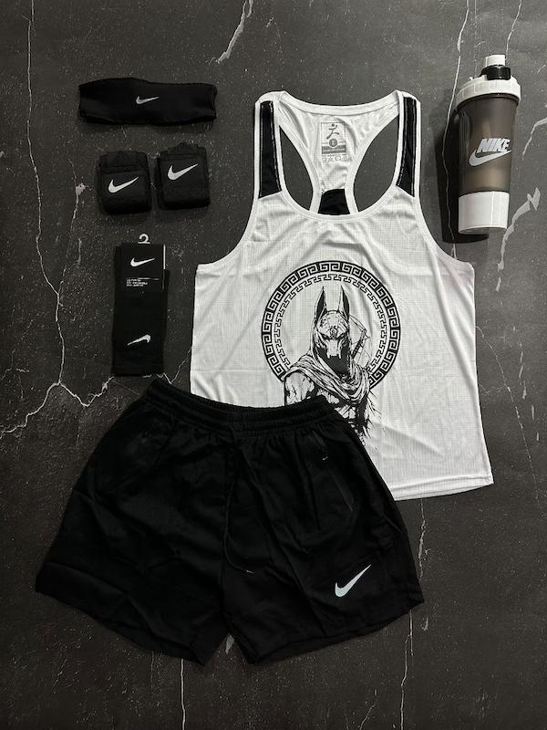 پکیج کد E1841 شامل رکابی قهرمانی + شلوارک آیرو + جوراب ساقدار + شیکر دو تیکه + مچ بند چسب نانو + هدبند با تم سفید مشکی 🖤🤍