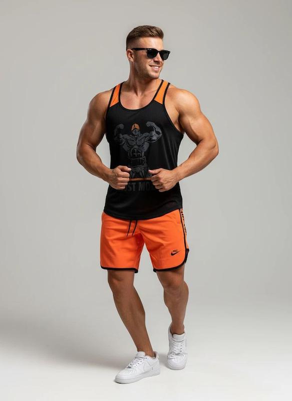 پکیج کد S2904 شامل رکابی + شلوارک با تم مشکی نارنجی