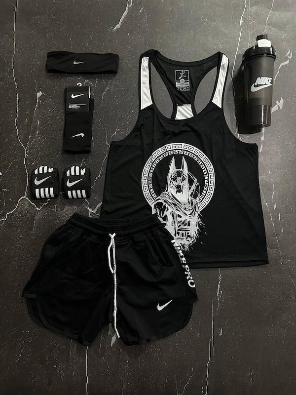 پکیج کد E1880 شامل رکابی قهرمانی + شلوارک + جوراب ساقدار + شیکر دو تیکه + مچ بند چسب نانو + هدبند با تم مشکی  🖤