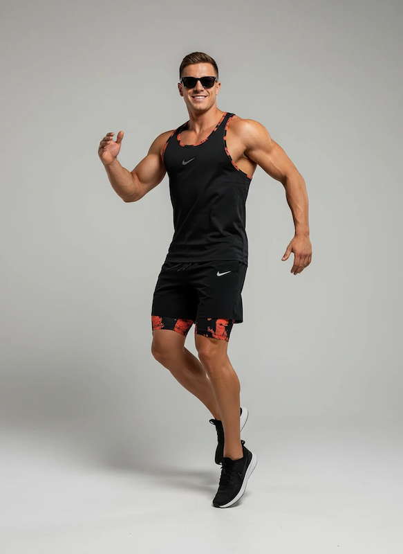 پکیج کد E1883 شامل رکابی قهرمانی + شلوارک کشاله دار چریکی با تم مشکی نارنجی 🖤🧡 