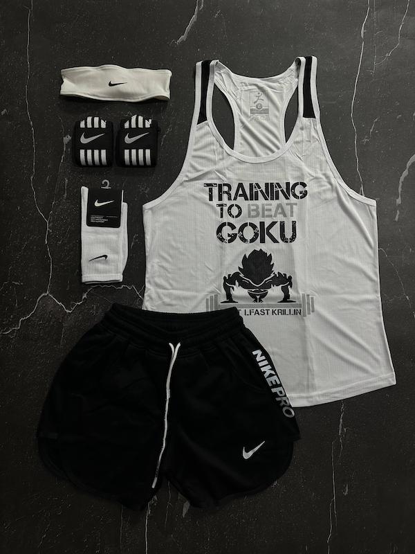 پکیج کد E1909 شامل رکابی قهرمانی + شلوارک + جوراب ساقدار + مچ بند چسب نانو + هدبند با تم سفید مشکی 🔥🖤