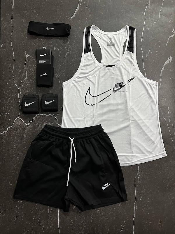 پکیج کد E1931 شامل رکابی قهرمانی + شلوارک + جوراب ساقدار + مچ بند چسب نانو + هدبند با تم سفید مشکی 🤍🖤