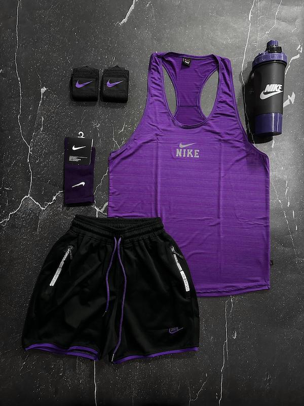 پکیج کد E1932 شامل رکابی قهرمانی + شلوارک + جوراب ساقدار + مچ بند چسب نانو + شیکر دو تیکه با تم بنفش مشکی 💜🖤