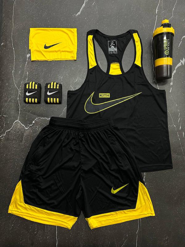 پکیج کد E1937 شامل رکابی قهرمانی + شلوارک + اسکارف + شیکر دو تیکه + مچ بند چسب نانو با تم مشکی زرد 🖤💛