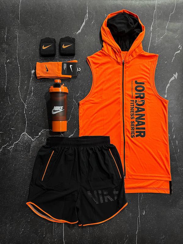 پکیج کد E1953 شامل رکابی کلاهدار + شلوارک + جوراب ساقدار + شیکر دو تیکه + مچ بند چسب نانو با تم نارنجی مشکی🔥😍