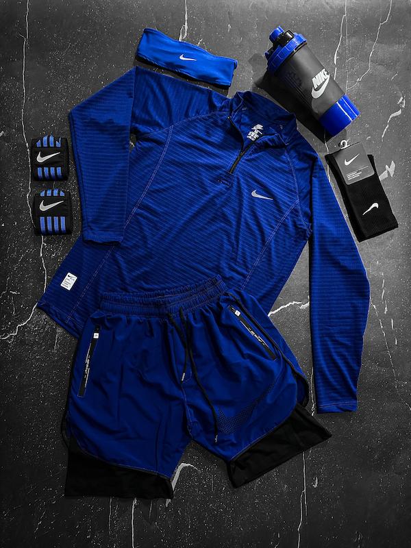 پکیج کد E1957 شامل تیشرت آستین بلند نیم زیپ + شلوارک کشاله دار + هدبند + شیکر دو تیکه + مچ بند چسب نانو + جوراب با تم آبی 💙🔥