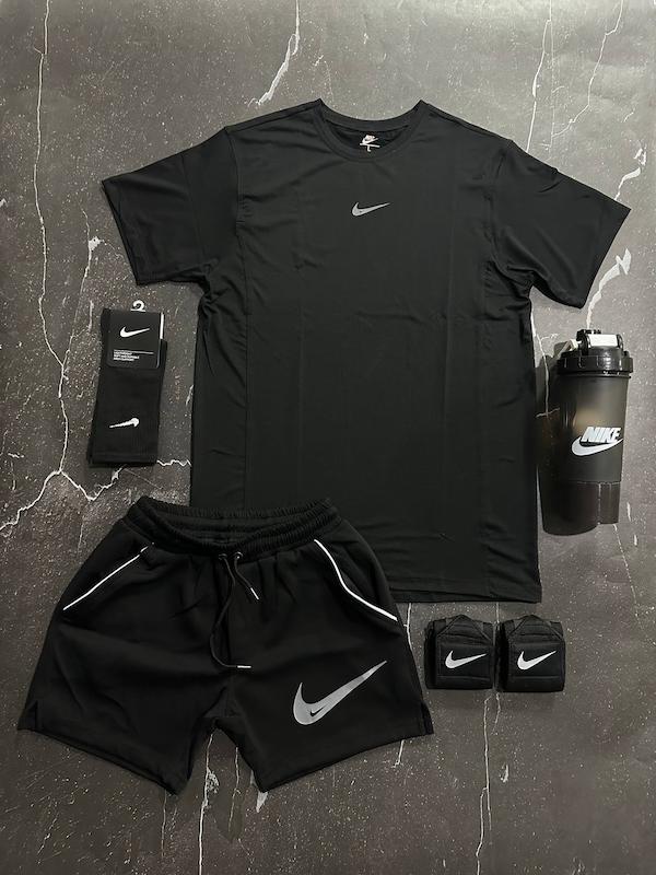 پکیج کد E1962 شامل تیشرت + شلوارک + شیکر دو تیکه + مچبند چسب نانو + جوراب ساقدار با تم مشکی 😍🔥