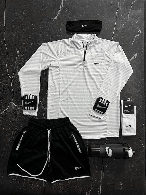 پکیج کد E1964 شامل تیشرت آستین بلند نیم زیپ + شلوارک + هدبند + شیکر دو تیکه + مچ بند چسب نانو + جوراب با تم سفید 🤍🔥