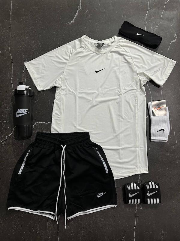 پکیج کد S3120 شامل تیشرت + شلوارک + هدبند + مچ بند چسب نانو + شیکر دو تیکه + جوراب ساقدار با تم سفید مشکی